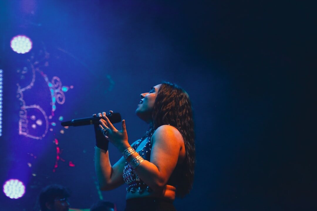 woman on stage performing