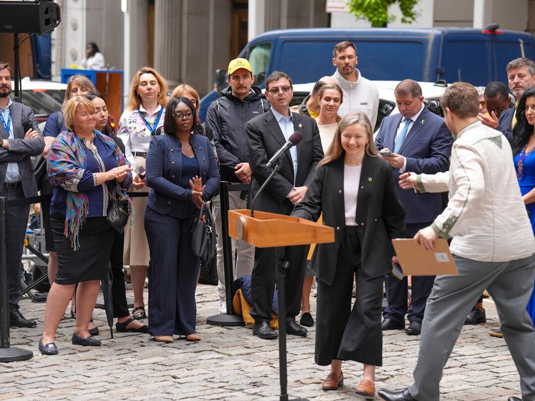 Row of microphones at a press conference